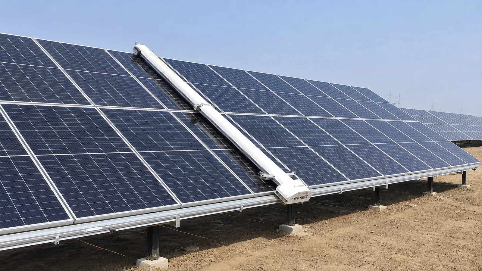 Semi-Automatic rail-assisted cleaner on a ground-mount solar table